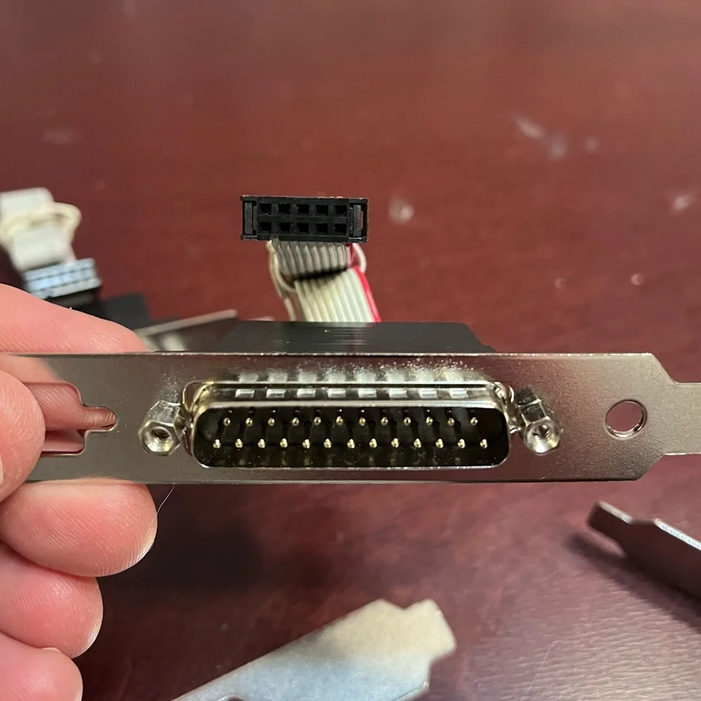 Misc computer slot connections and screws.
